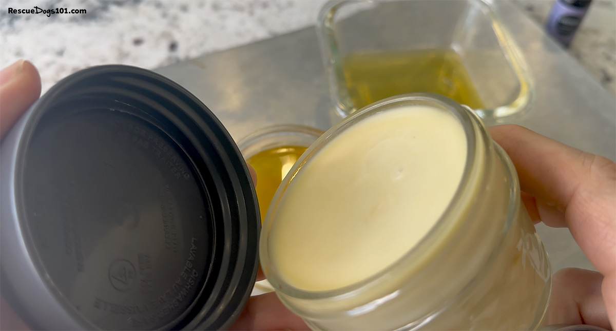 Homemade paw balm in glass jars.